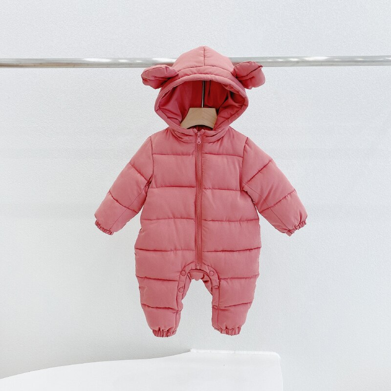 Front view of the hooded all-in-one snowsuit for little girls in soft winter fabric.