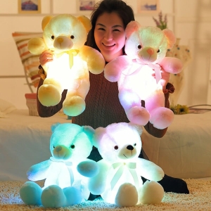 LED Light-Up Teddy Bear Plush Toy for Girls, in a child's bedroom – a fun and playful gift for girls from Little Pirates.