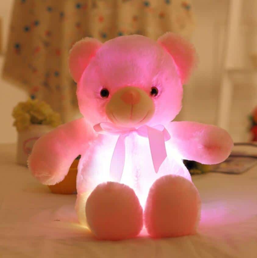 LED Light-Up Teddy Bear Plush Toy for Girls shown in a child's bedroom – stylish and cosy choice for girls from Little Pirates.