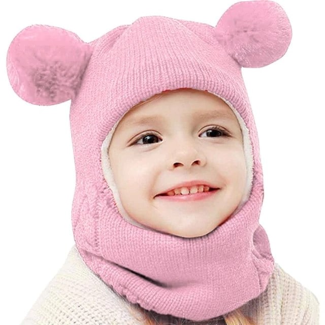 Front view of the girls' double pompom balaclava showing the cheerful pompoms and snug fit.