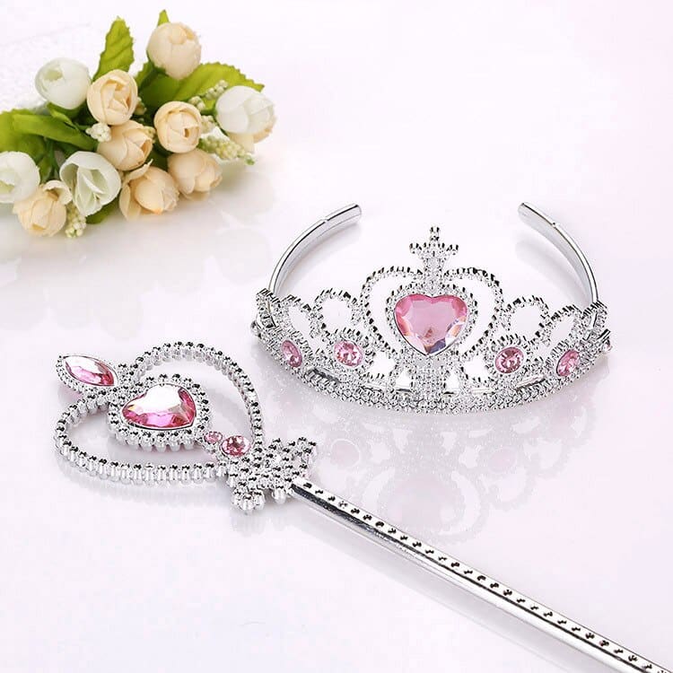 Close-up of the Frozen crown and magic wand set for girls, showing the sparkling silver and blue detail and floral accents.