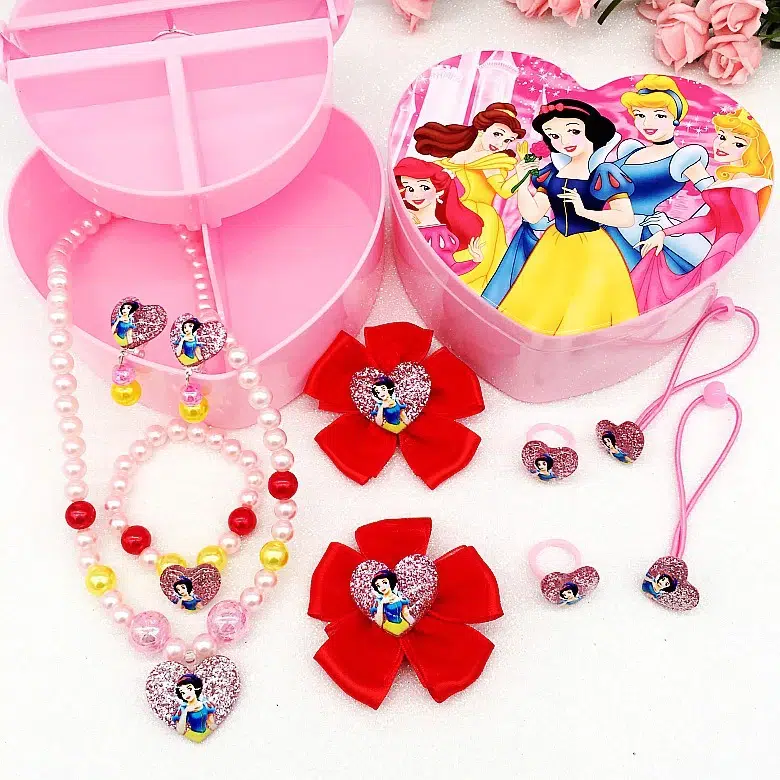 Open view of the Snow White pink heart jewellery box showing all 9 jewellery pieces arranged inside.