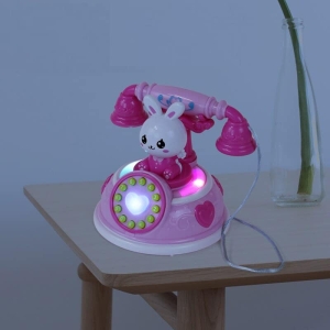Side and button detail of the pink toy phone for little girls.