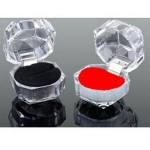 Acrylic jewellery box organiser for girls displayed on a grey background, elegant design.