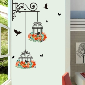 Charming wall stickers featuring delicate bird and flower patterns to add a nature-inspired touch to a girl's room.