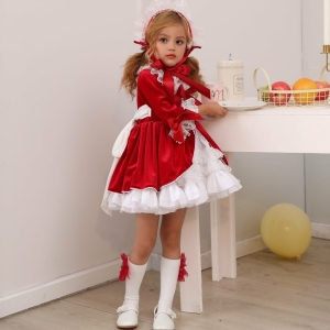Complete 4-piece red princess costume for girls displayed in a home setting.