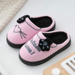 Side and sole detail of the soft cotton girls slippers, highlighting the comfortable and durable design.