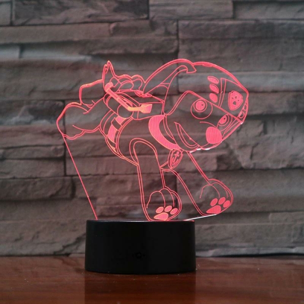 Zuma Paw Patrol 3D LED lamp glowing on a table in a home setting, showing the colourful light effect and fun character design.