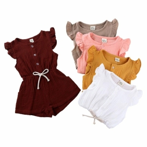 A girls' cotton and linen playsuit, breathable and perfect for hot weather with a natural, elegant look