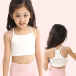 Close-up of the fabric and print detail on a girls' pure cotton vest top, soft and well-made