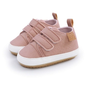 Close-up of the toe area of the faux leather shoes for baby girls, highlighting the quality finish and cute design.