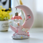 Pink moon and unicorn LED lamp for girls displayed on a table, a magical bedroom light.