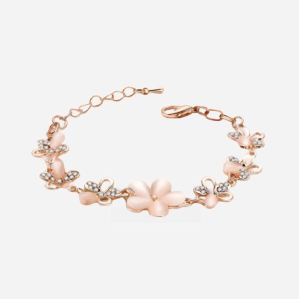 A delicate chain bracelet featuring a pretty flower pattern design on a white background, a charming jewellery piece for girls.