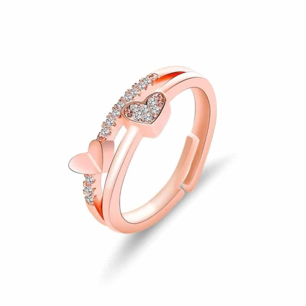 The adjustable heart ring for girls worn on a hand showing the elegant pearl and heart combination.