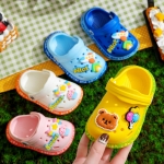 Close-up of the fun animal print pattern on girls beach sandals, highlighting the vibrant colours and sturdy sole.