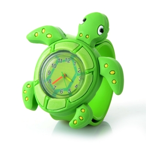 A charming 3D turtle character watch for children, crafted from soft flexible plastic with a fun design, perfect as a first watch for little ones.