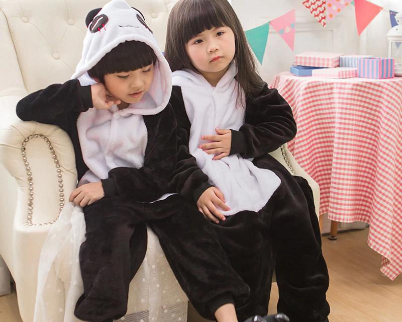 An incredibly warm and cute girls cartoon fleece pyjama onesie, featuring an adorable character design with lots of cosy snuggly warmth for winter nights.