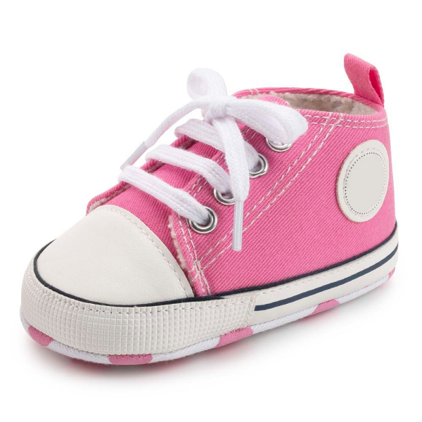 Pretty pink Converse-style trainers for girls, a classic and cheerful choice for everyday adventures and fun outdoor play.