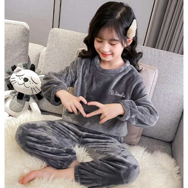 Adorable girls hooded fleece pyjamas, warm and snuggly with the added fun of a cosy hood for extra warmth and playful style.