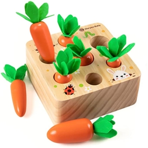 A brilliant Montessori wooden carrot set for developing hand-eye coordination in girls, encouraging fine motor skills through fun pulling and placing play.