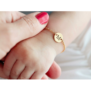 Detailed close-up of the Initial Engraved Bracelet for Baby Girl showing charm, finish and clasp quality.