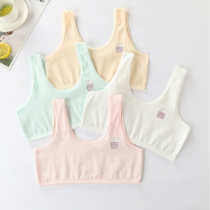 The Pack of 4 Girls' Printed Cotton Crop Tops shown worn and styled, showcasing the fit and colourful design.