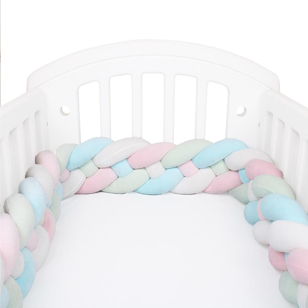 The Multicolour Braided Baby Cot Bumper for Girls shown in a styled nursery setting, adding colour and comfort for baby girls.
