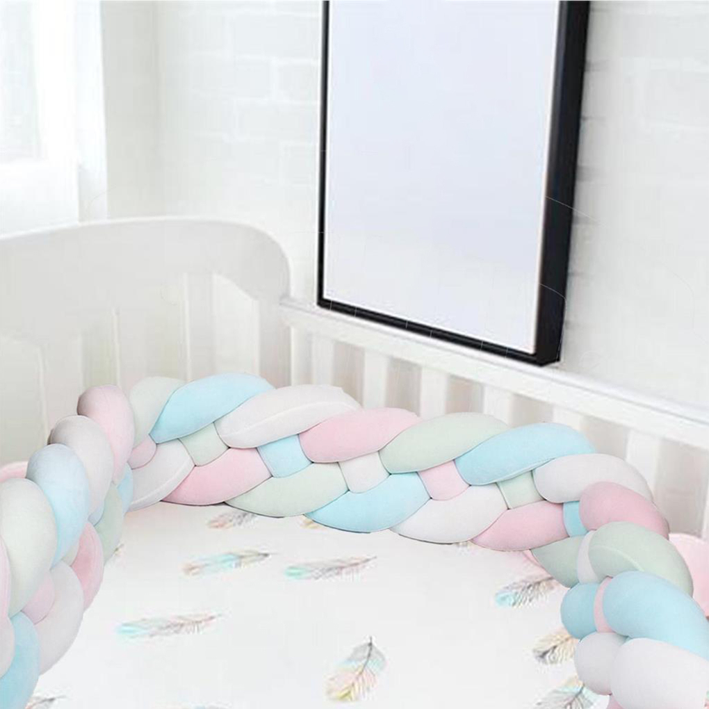 Close-up of the detail, materials and design of the Multicolour Braided Baby Cot Bumper for Girls for baby girls.