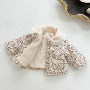 A baby girls padded coat laid open and flat, featuring a pretty floral lace outer fabric and warm inner lining.