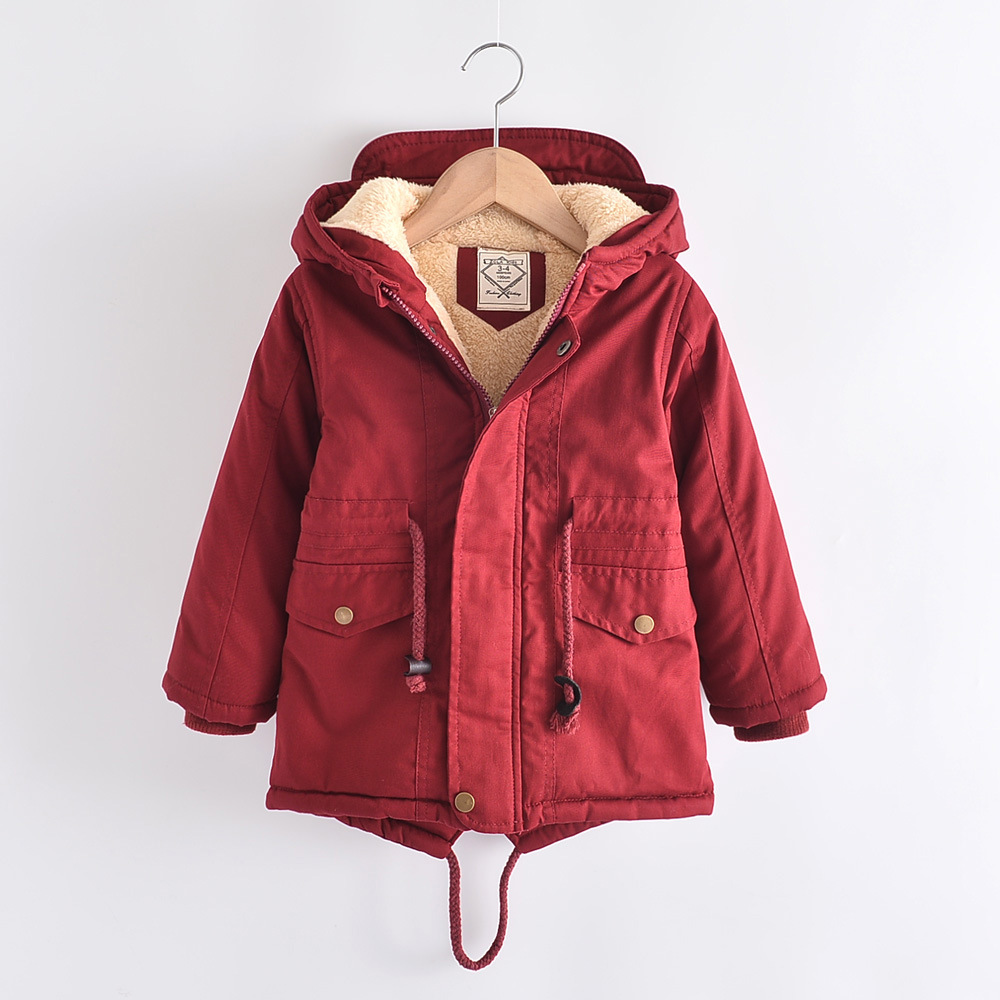 Side view of the pink girls hooded parka on a hanger, showing the hood structure and warm lined fabric.