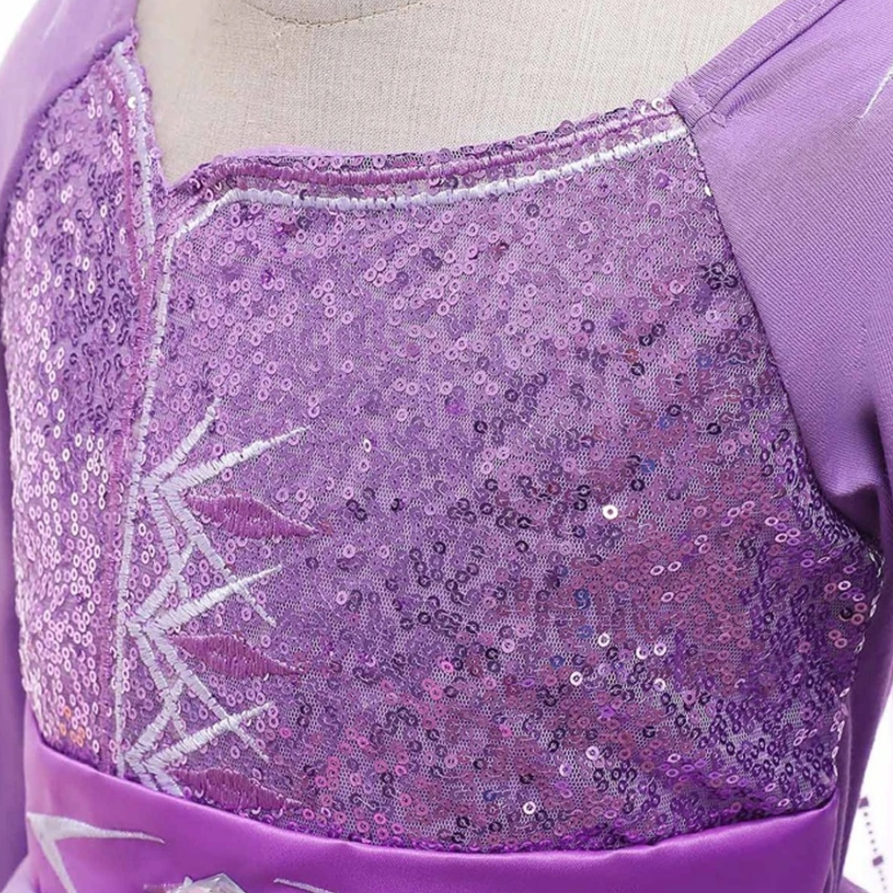 Complete purple Elsa fancy dress set including the sequin gown, matching tiara, blonde braided wig, and small handbag for the ultimate Frozen princess experience.