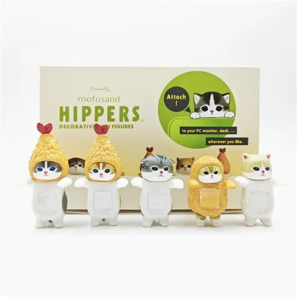 Five Mofusand Hippers kawaii cat figurines in disguise costumes, lined up on their white and green mystery boxes.