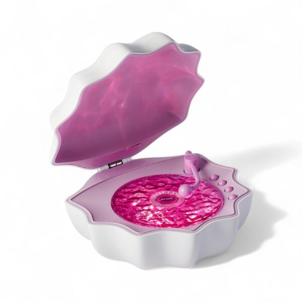 White shell-shaped Bluetooth night light with a rose-pink interior that projects beautiful ocean-inspired reflections onto walls.