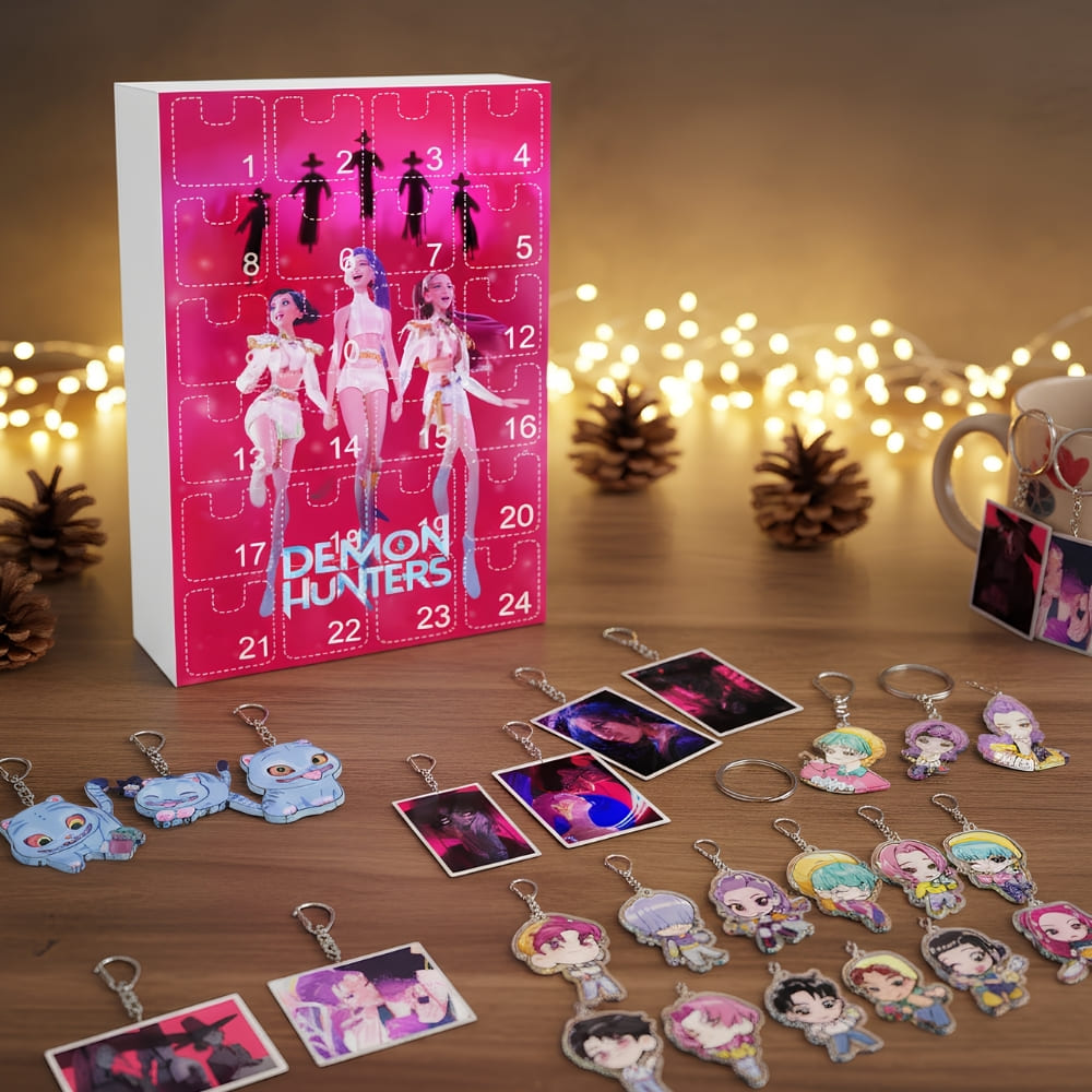 The blue K-pop Demon Hunters advent calendar featuring the three iconic Huntrix characters on the front of the festive packaging.