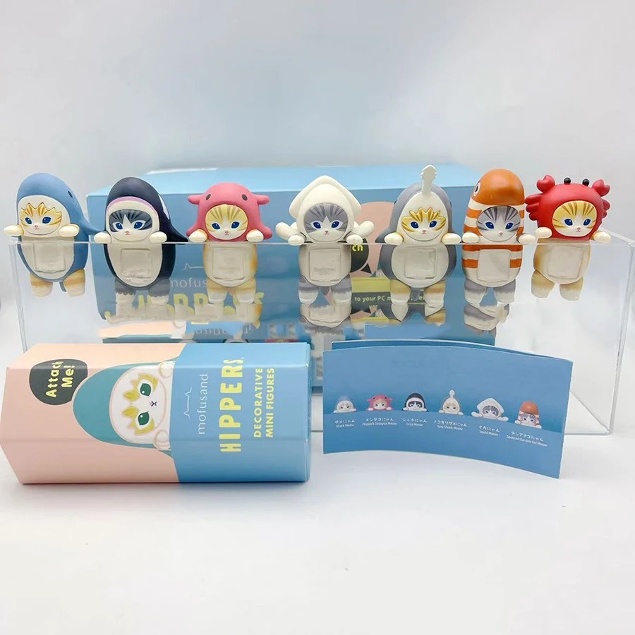Mofusand Hippers magnets dressed as panda, bee, rabbit, bear, and sheep, displayed on top of their blind box packaging.