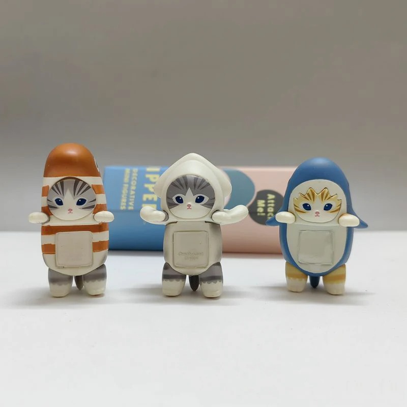 Close-up of the Mofusand Hippers panda and bee magnet figures, showing their detailed animal costumes and kawaii expressions.