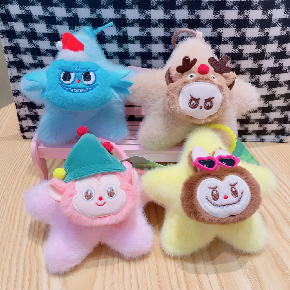 Full view of the yellow star-shaped Labubu-style plush keyring on a sky blue background, a fun and quirky accessory for bag charms or keys.