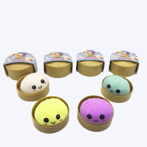 Four colourful squishy dumpling mystery boxes with four different model squishies displayed in front, fun surprise gifts for girls.