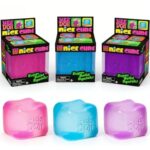 Three Needoh ice cube sensory squeeze toys in pink, blue, and violet beside their square boxes, a calming and satisfying stress toy for girls.