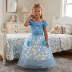 Full view of a girl wearing the sky-blue LED Cinderella fancy dress costume, shimmering with a magical glow for enchanting dress-up adventures.