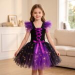 Girl wearing a black and purple witch dress with crossed ribbons and white LEDs